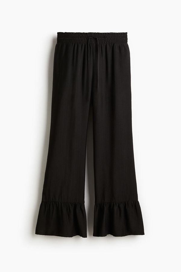 Pantalón con cordón de ajuste y ribete de volante