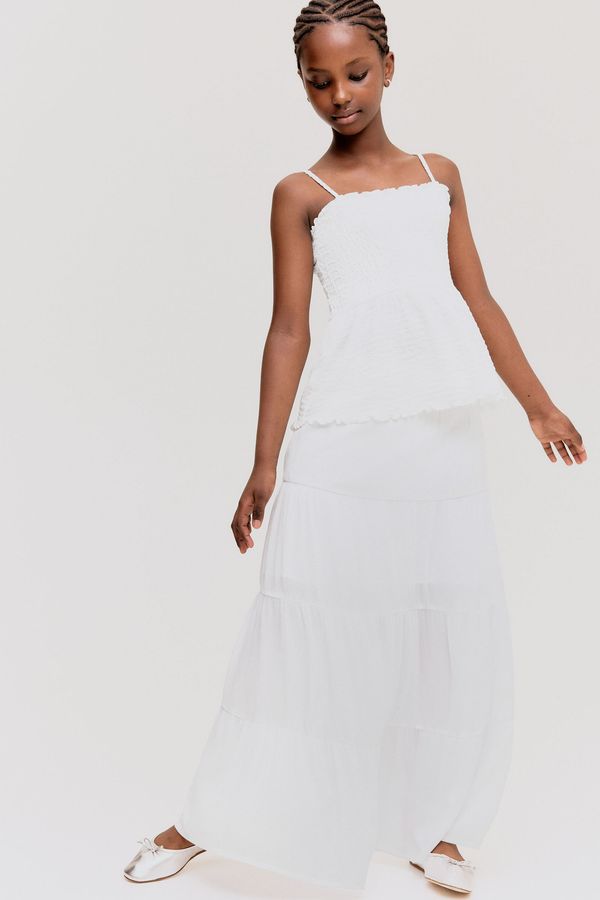 Smocked tiered skirt