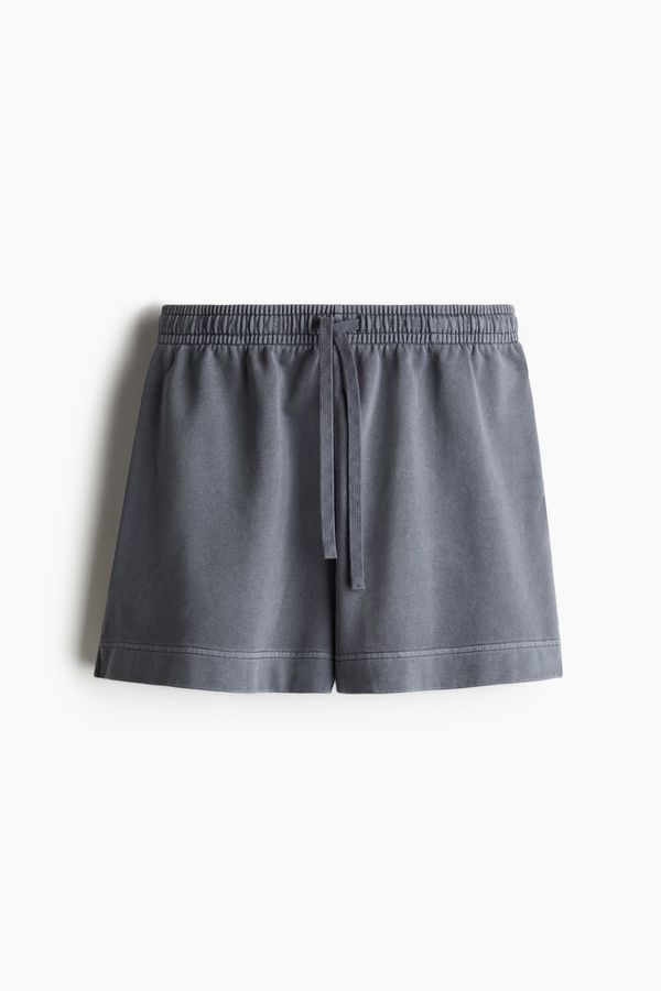 Pantalón sudadera corto en algodón lavado
