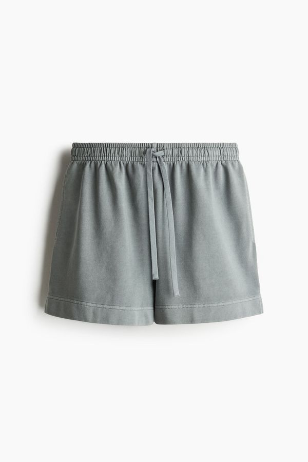Pantalón sudadera corto en algodón lavado