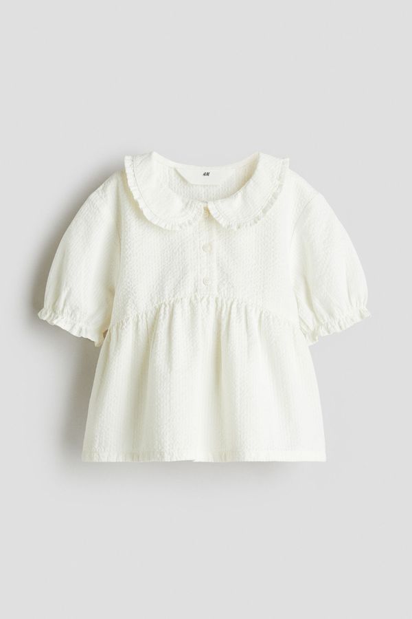 Blusa con peplo