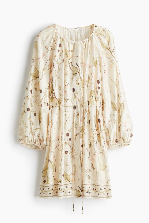 Vestido oversize con cinturón de anudar