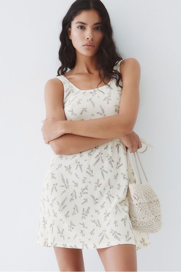 Vestido de punto con efecto arrugado