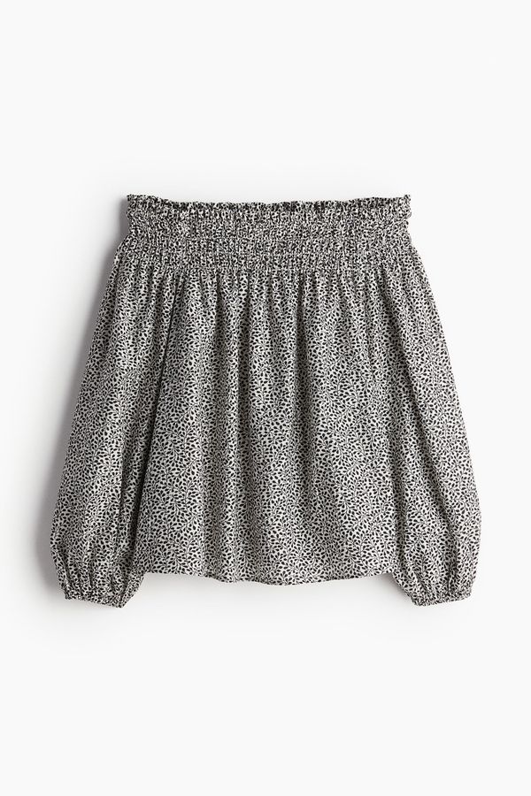 Blusa off-the-shoulder