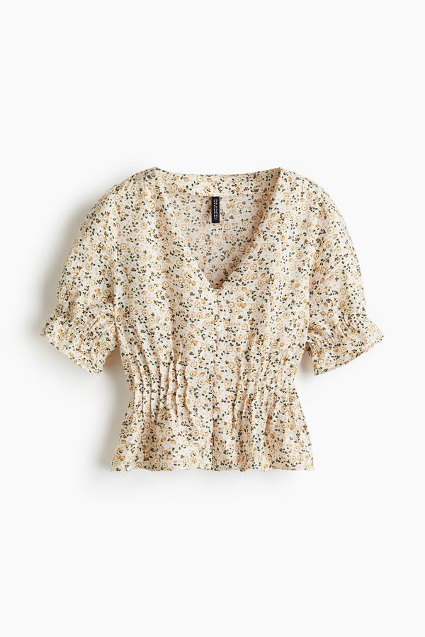 Blusa con peplo
