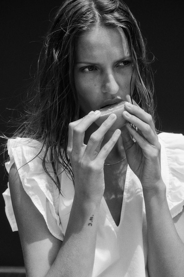 Blusa con ribetes de volante